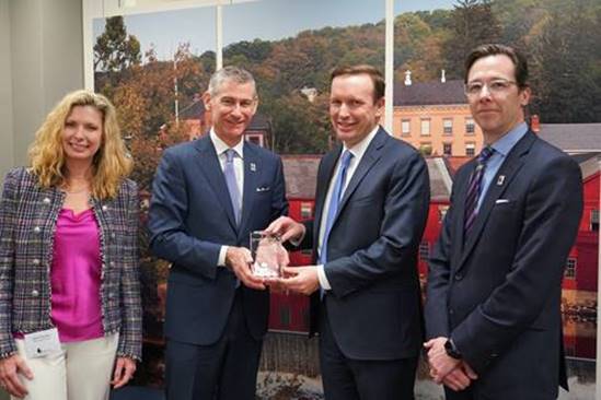 Senator Chris Murphy receives award with Jane Hunter, David Costello and Frank Montie